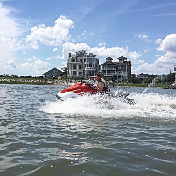 a small boat in a body of water