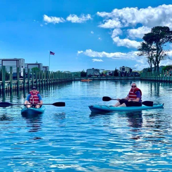 a small boat in a body of water
