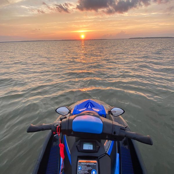 a boat sitting on top of a body of water