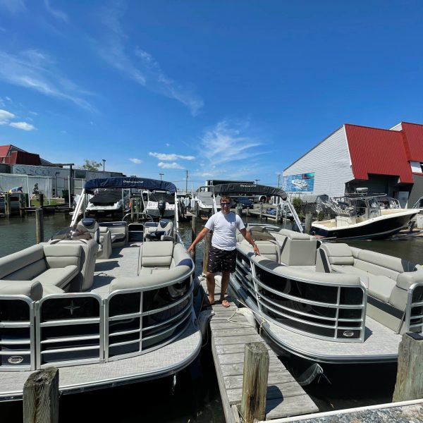 a boat is docked next to a body of water