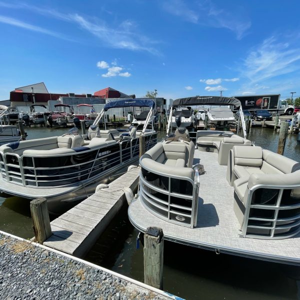 a boat is docked next to a body of water