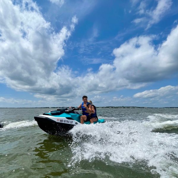 a man riding a wave on a surfboard in the water
