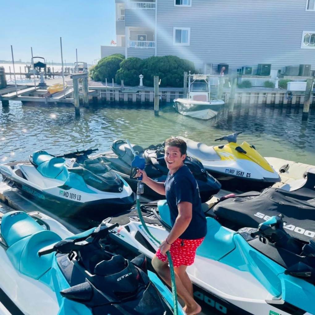 a group of people on a boat in the water