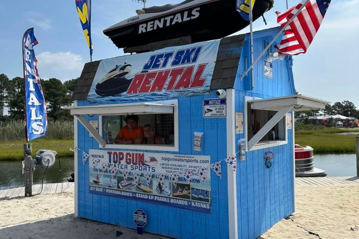 a sign on a beach