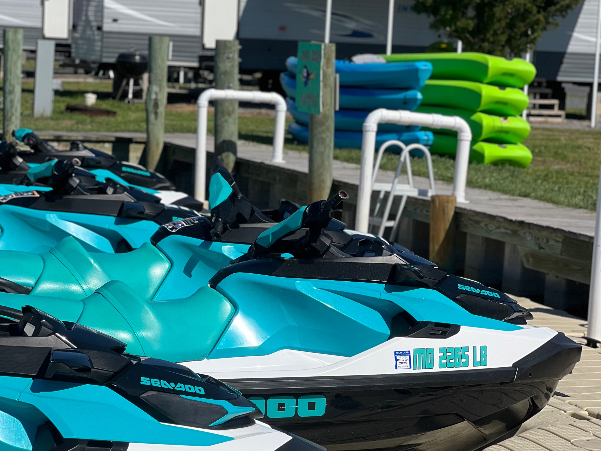 a blue boat sitting on top of a car